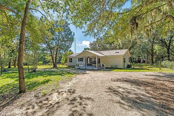 5 Acres of Land with Home for Sale in Lady Lake, Florida