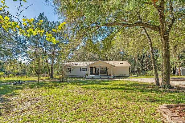 5 Acres of Land with Home for Sale in Lady Lake, Florida