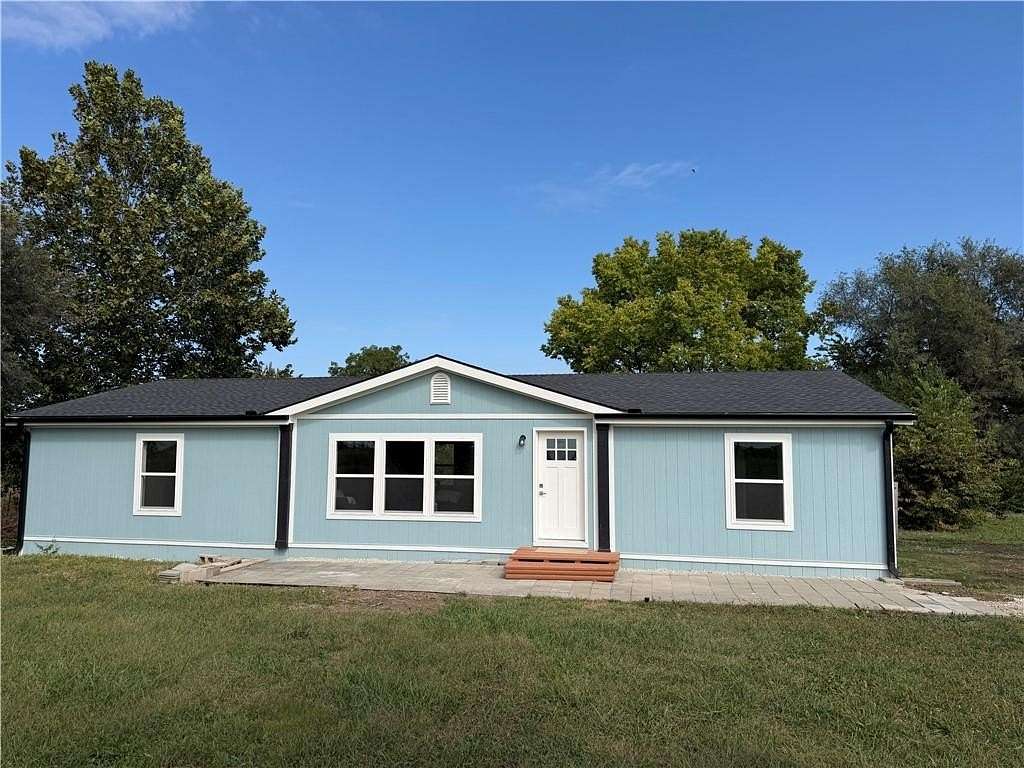 6.34 Acres of Land with Home for Sale in Warrensburg, Missouri