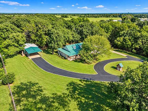 3.25 Acres of Land with Home for Sale in Grandview, Texas