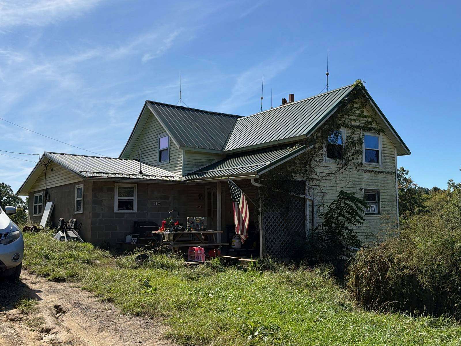 16.8 Acres of Recreational Land with Home for Auction in Philo, Ohio