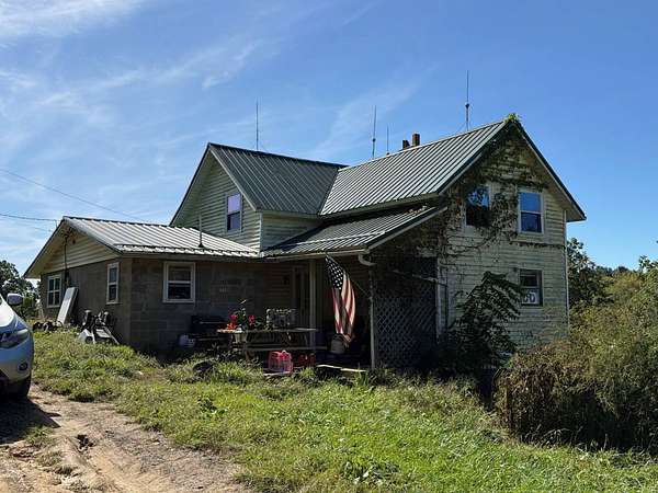 16.8 Acres of Recreational Land with Home for Auction in Philo, Ohio