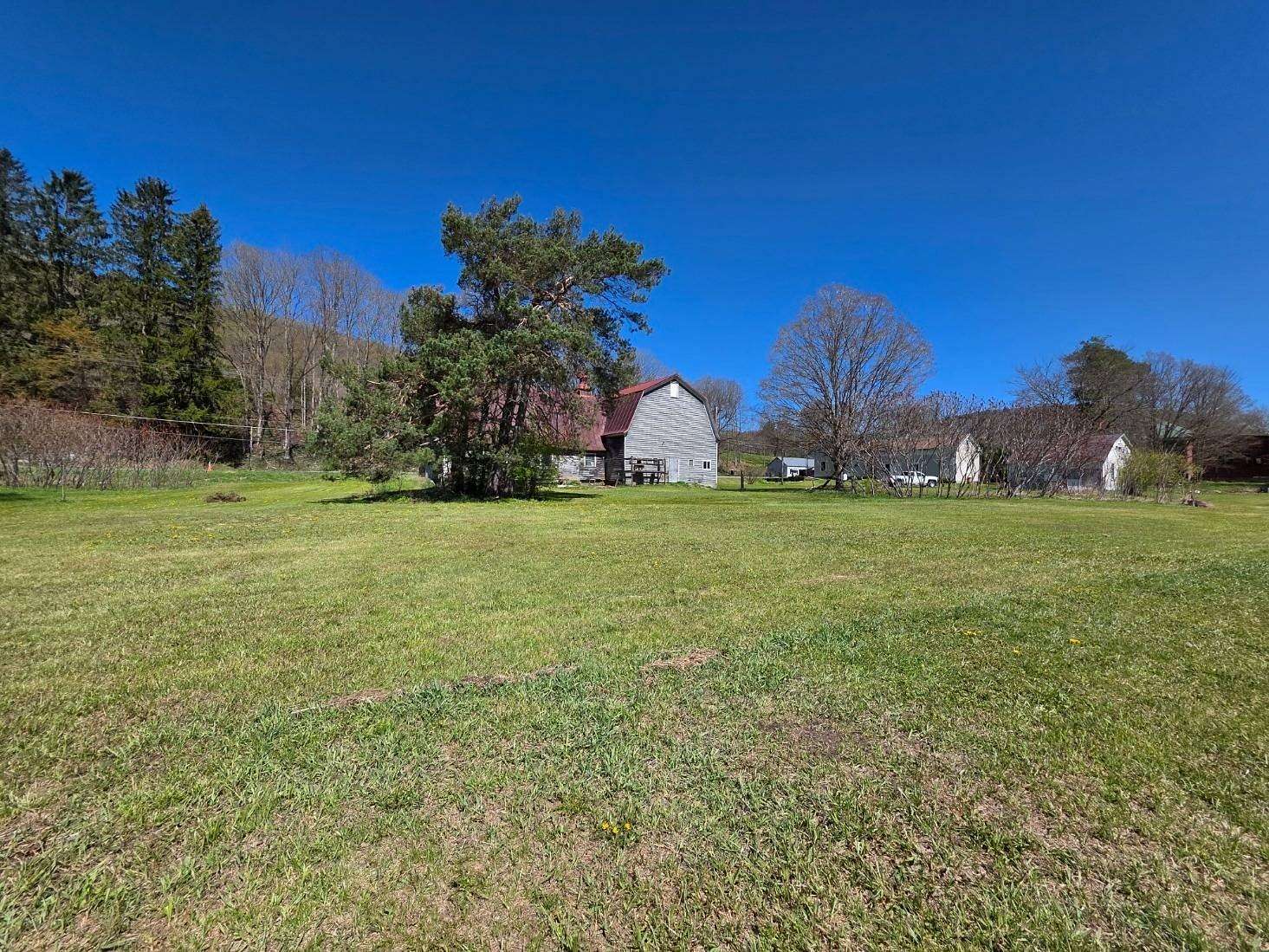 5.56 Acres of Land with Home for Sale in East Worcester, New York
