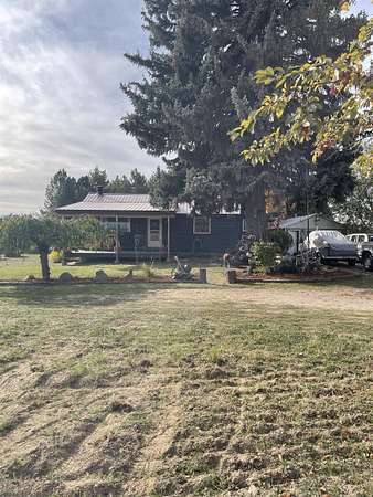 3.78 Acres of Land with Home for Sale in Colbert, Washington