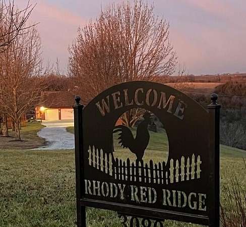 13.1 Acres of Land with Home for Sale in Foster, Kentucky
