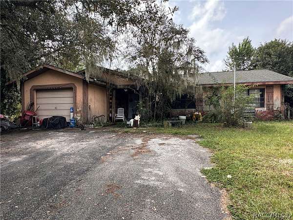 9.64 Acres of Land with Home for Sale in Dunnellon, Florida