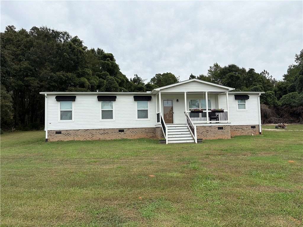 7 Acres of Land with Home for Sale in Central, South Carolina