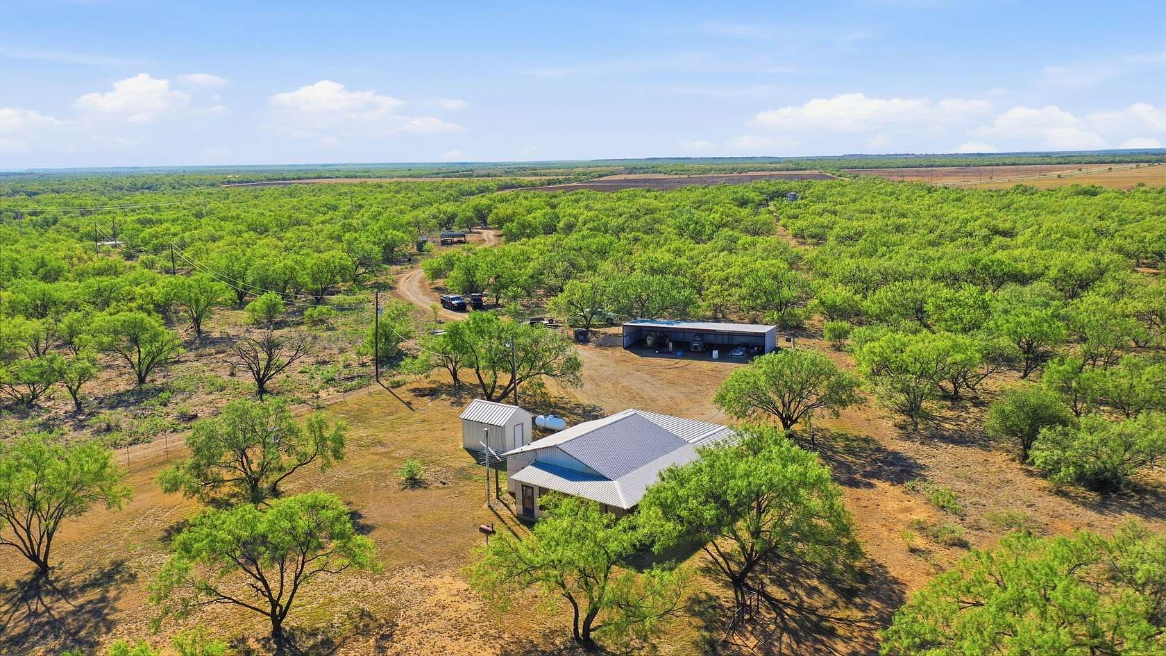 152 Acres of Recreational Land with Home for Sale in Woodson, Texas