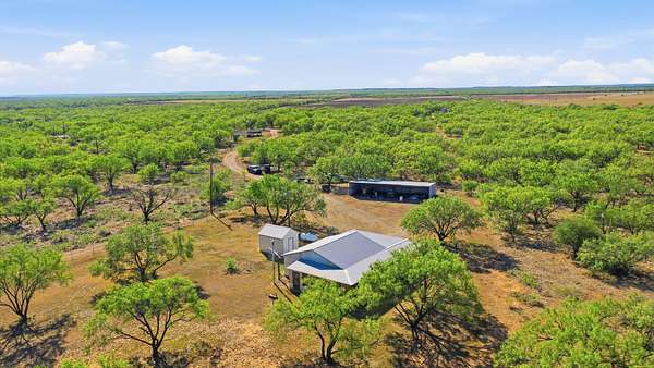 152 Acres of Recreational Land with Home for Sale in Woodson, Texas