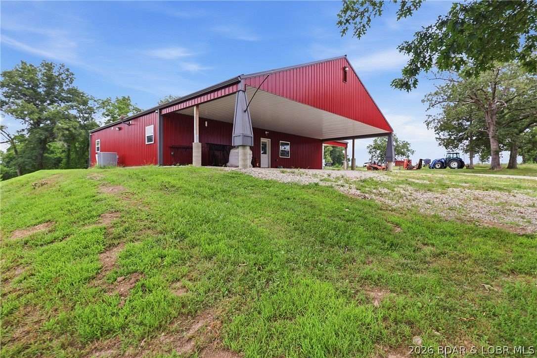 20 Acres of Recreational Land with Home for Sale in Brumley, Missouri