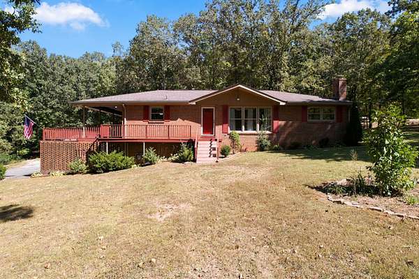 4.84 Acres of Land with Home for Sale in Burns, Tennessee