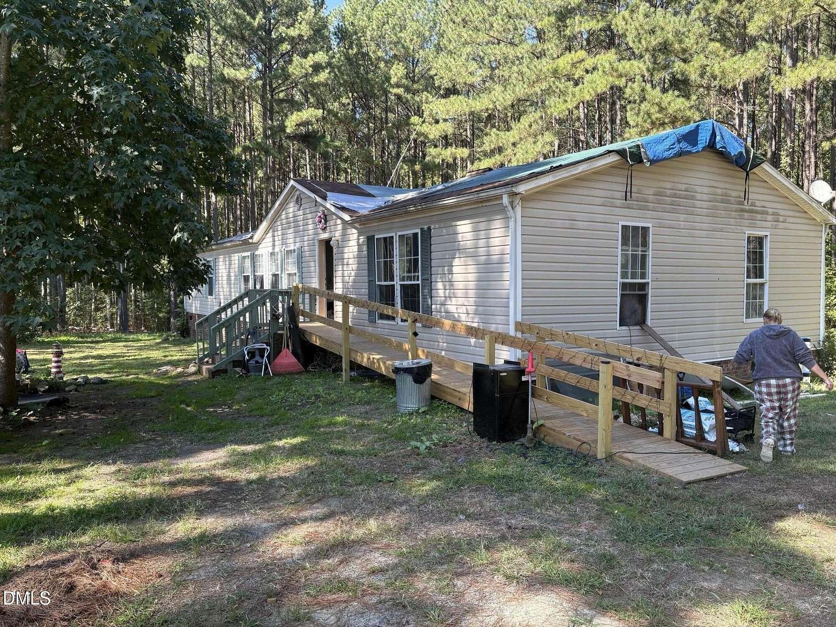 11.2 Acres of Land with Home for Sale in Burlington, North Carolina