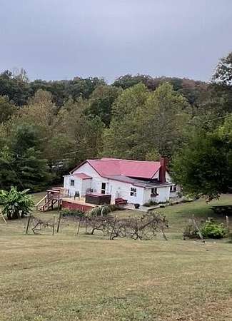 32 Acres of Land with Home for Sale in Irvine, Kentucky