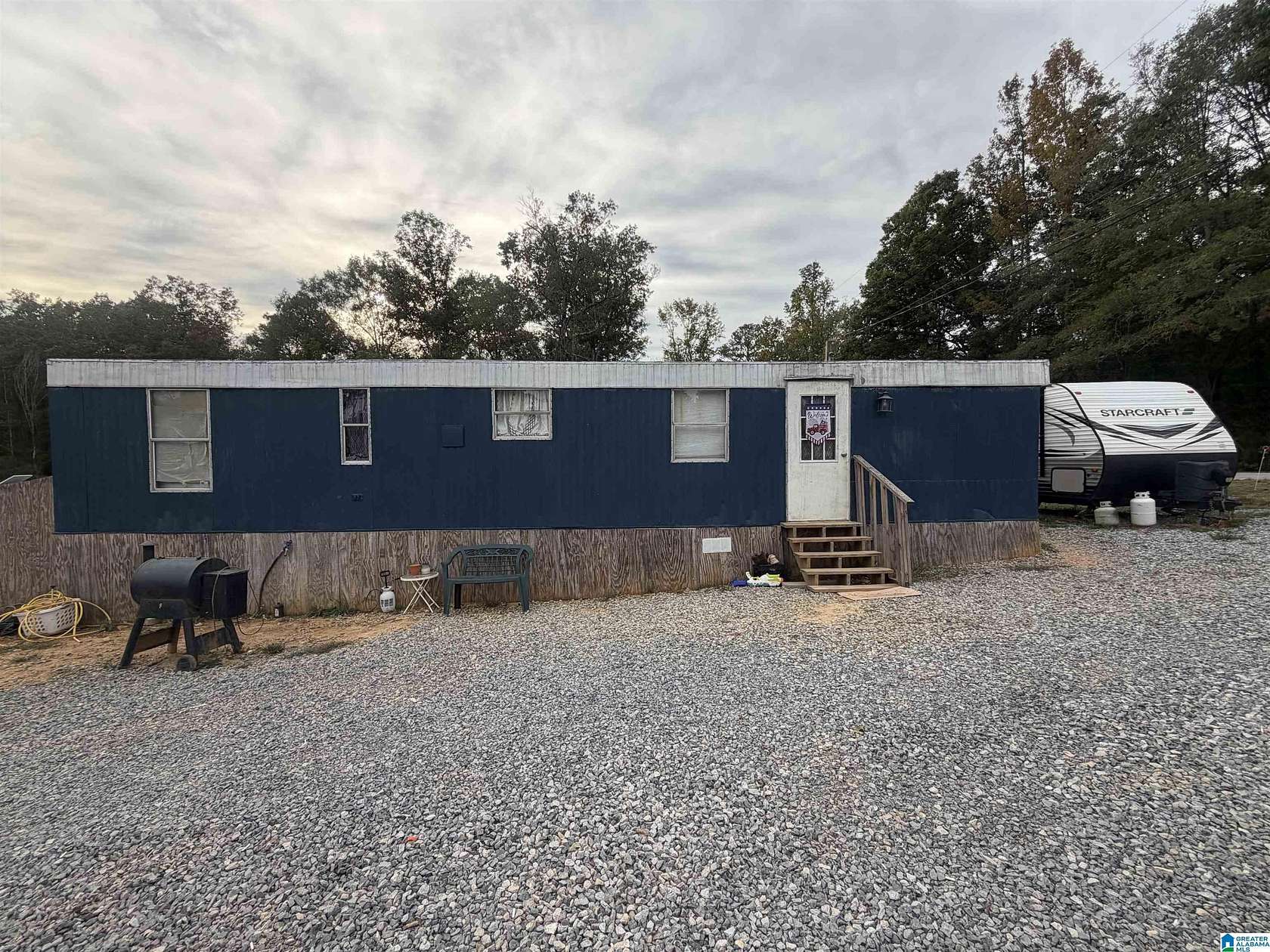 9.8 Acres of Land with Home for Sale in Ohatchee, Alabama