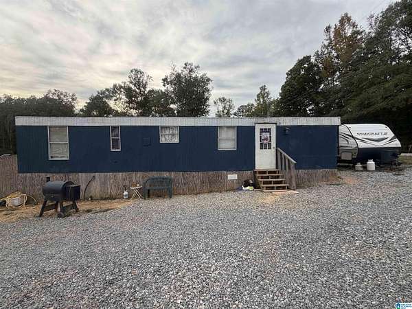 9.8 Acres of Land with Home for Sale in Ohatchee, Alabama