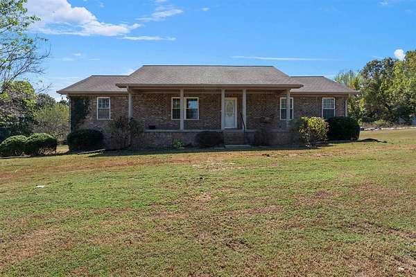 12.4 Acres of Land with Home for Sale in Scottsville, Kentucky