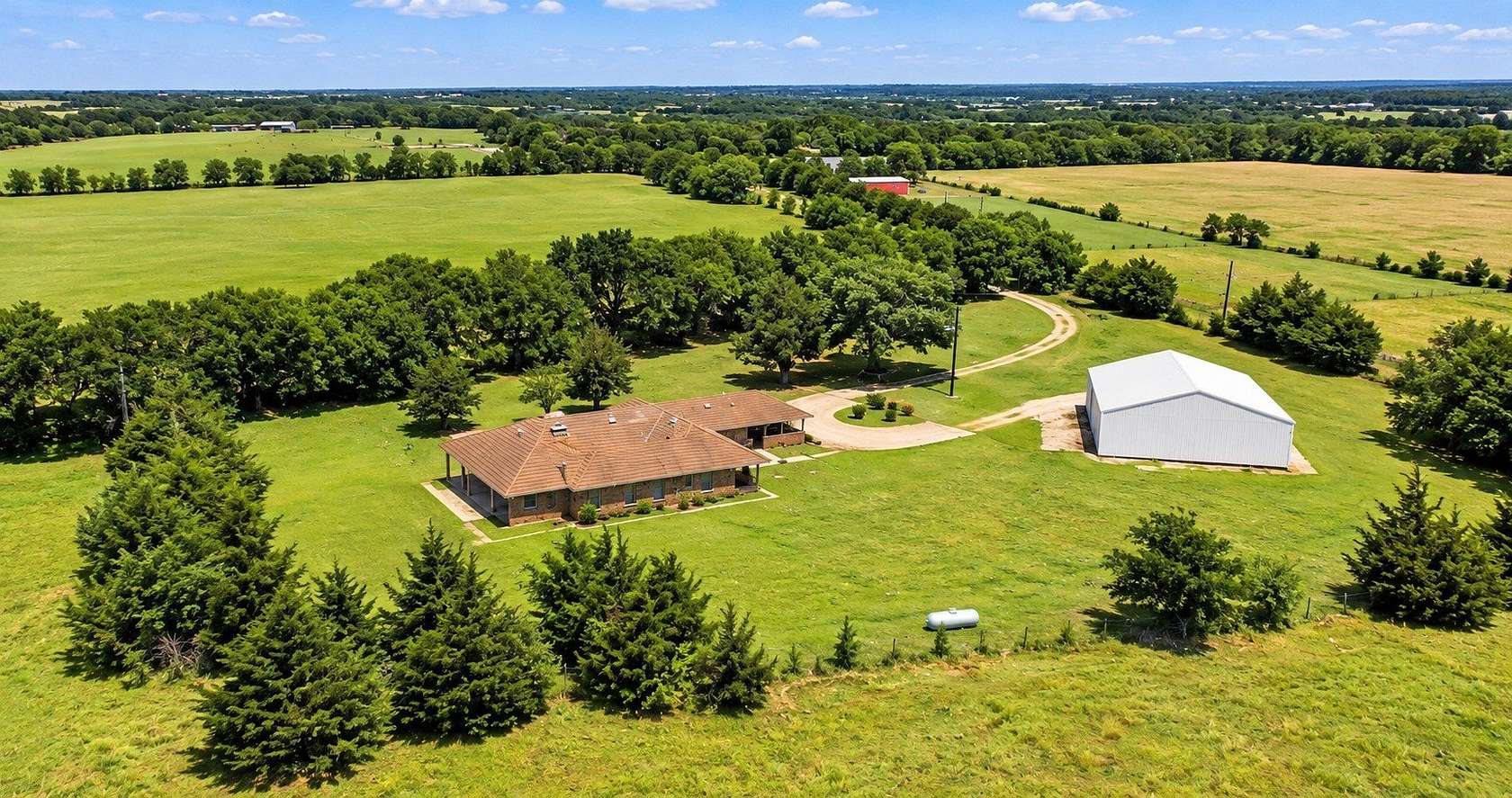 98.2 Acres of Land with Home for Lease in Anna, Texas