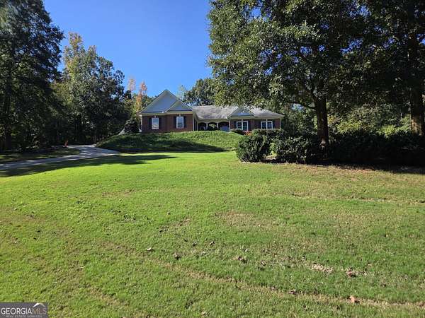 1.5 Acres of Land with Home for Sale in Hoschton, Georgia