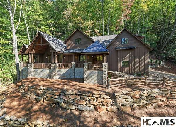 3.45 Acres of Land with Home for Sale in Cashiers, North Carolina