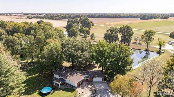 5 Acres of Land with Home for Sale in Alhambra, Illinois