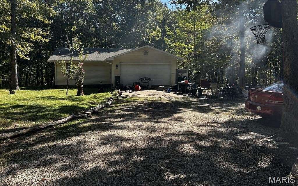 5.75 Acres of Land with Home for Sale in Poplar Bluff, Missouri
