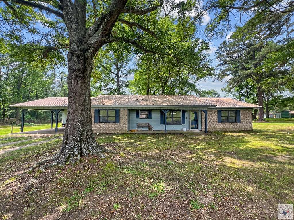 5.65 Acres of Land with Home for Sale in New Boston, Texas