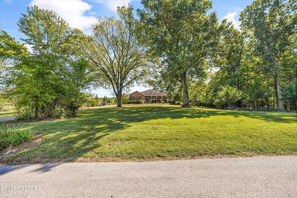5 Acres of Land with Home for Sale in Louisville, Tennessee