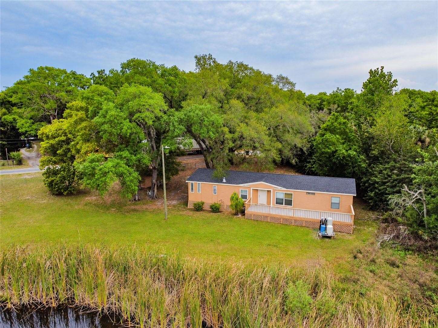 1.76 Acres of Land with Home for Sale in Lutz, Florida