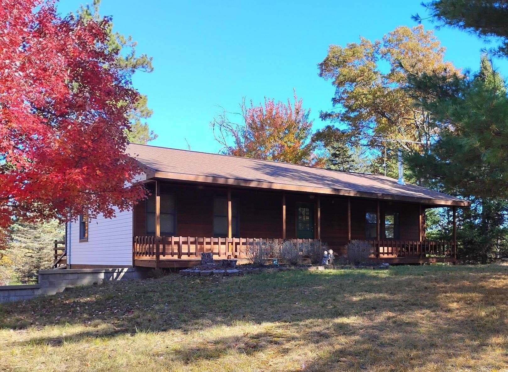 10 Acres of Recreational Land with Home for Sale in Roscommon, Michigan