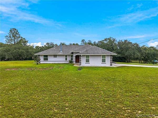 1.88 Acres of Land with Home for Sale in Dunnellon, Florida