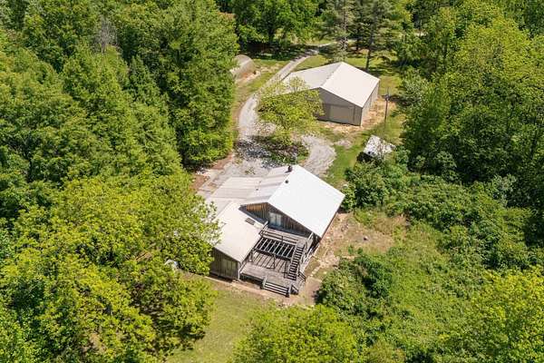 127 Acres of Land with Home for Sale in Tamms, Illinois