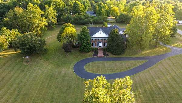 4.6 Acres of Land with Home for Sale in Madisonville, Kentucky