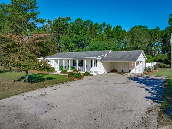 13.2 Acres of Recreational Land with Home for Sale in New Zion, South Carolina