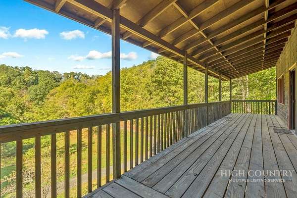 11.8 Acres of Land with Home for Sale in Lansing, North Carolina