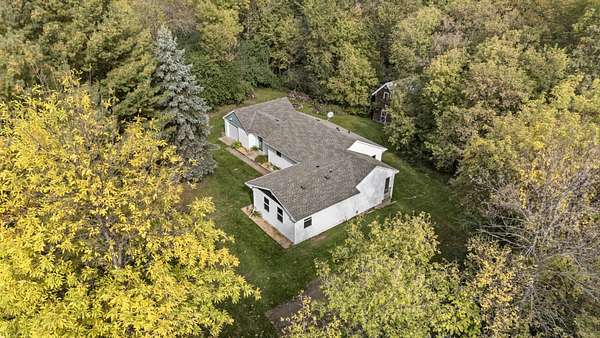 5 Acres of Land with Home for Sale in Stanchfield, Minnesota
