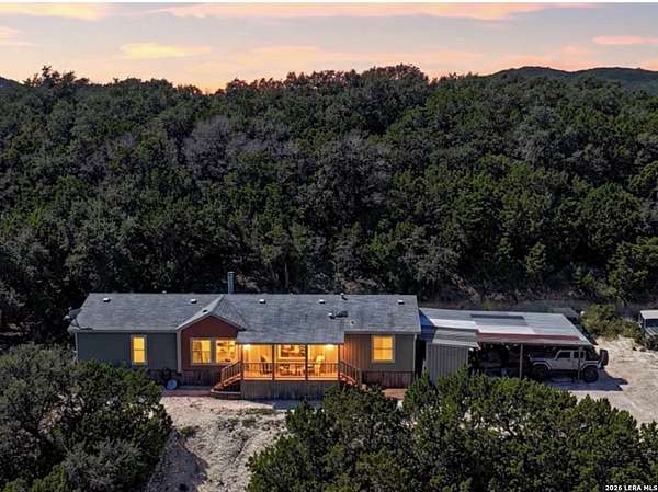 1.5 Acres of Land with Home for Sale in Lakehills, Texas