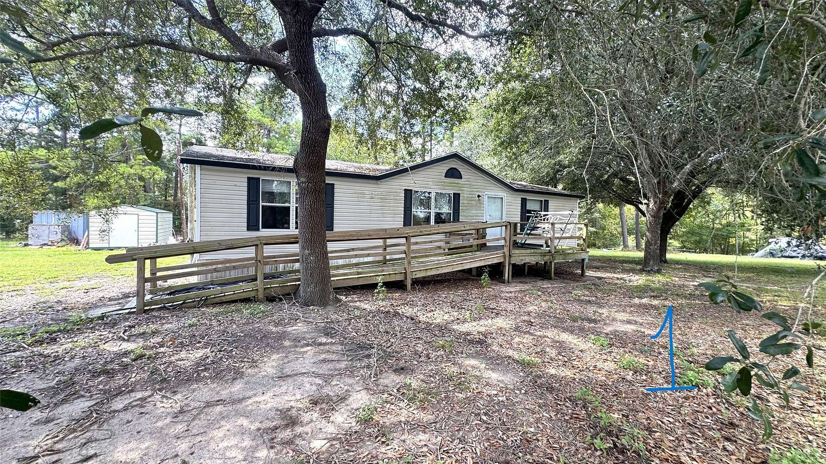 3 Acres of Land with Home for Sale in Huntsville, Texas