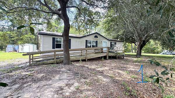 3 Acres of Land with Home for Sale in Huntsville, Texas