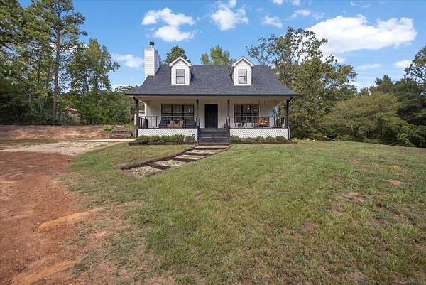 2.62 Acres of Land with Home for Sale in Gilmer, Texas