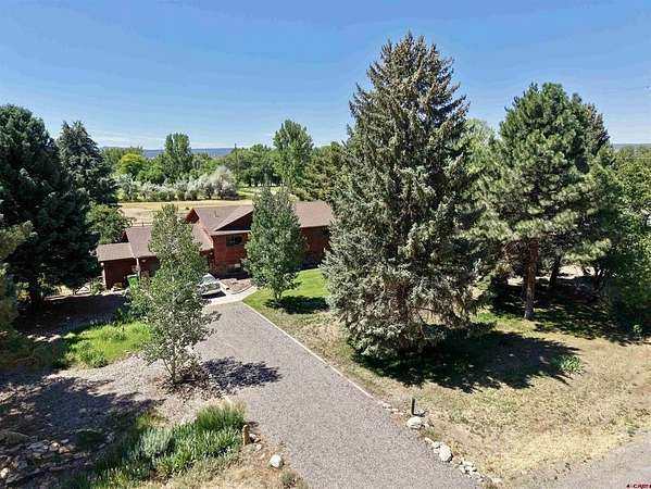 2 Acres of Land with Home for Sale in Montrose, Colorado