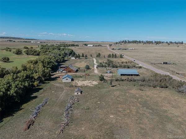 129 Acres of Agricultural Land with Home for Sale in Franktown, Colorado