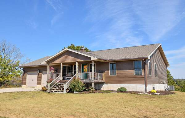 49 Acres of Land with Home for Sale in Fordland, Missouri