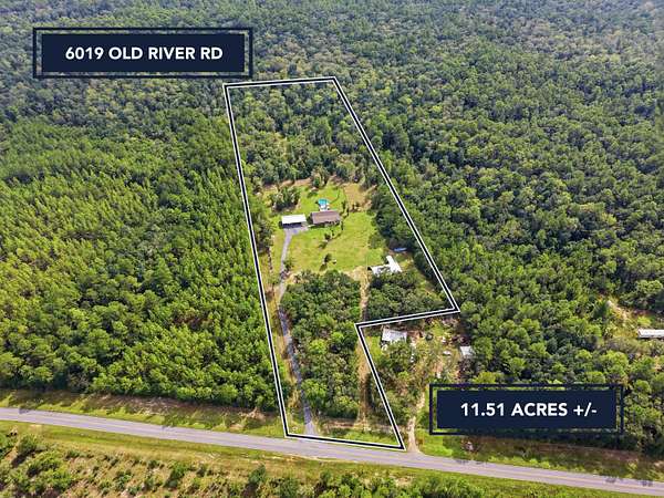 11.5 Acres of Land with Home for Sale in Baker, Florida