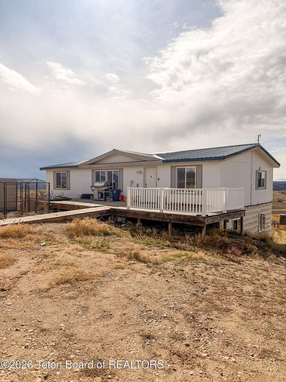 10 Acres of Recreational Land with Home for Sale in Boulder, Wyoming