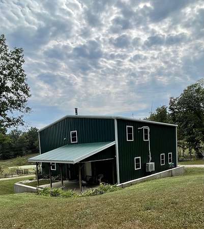 10.2 Acres of Recreational Land with Home for Sale in Chamois, Missouri