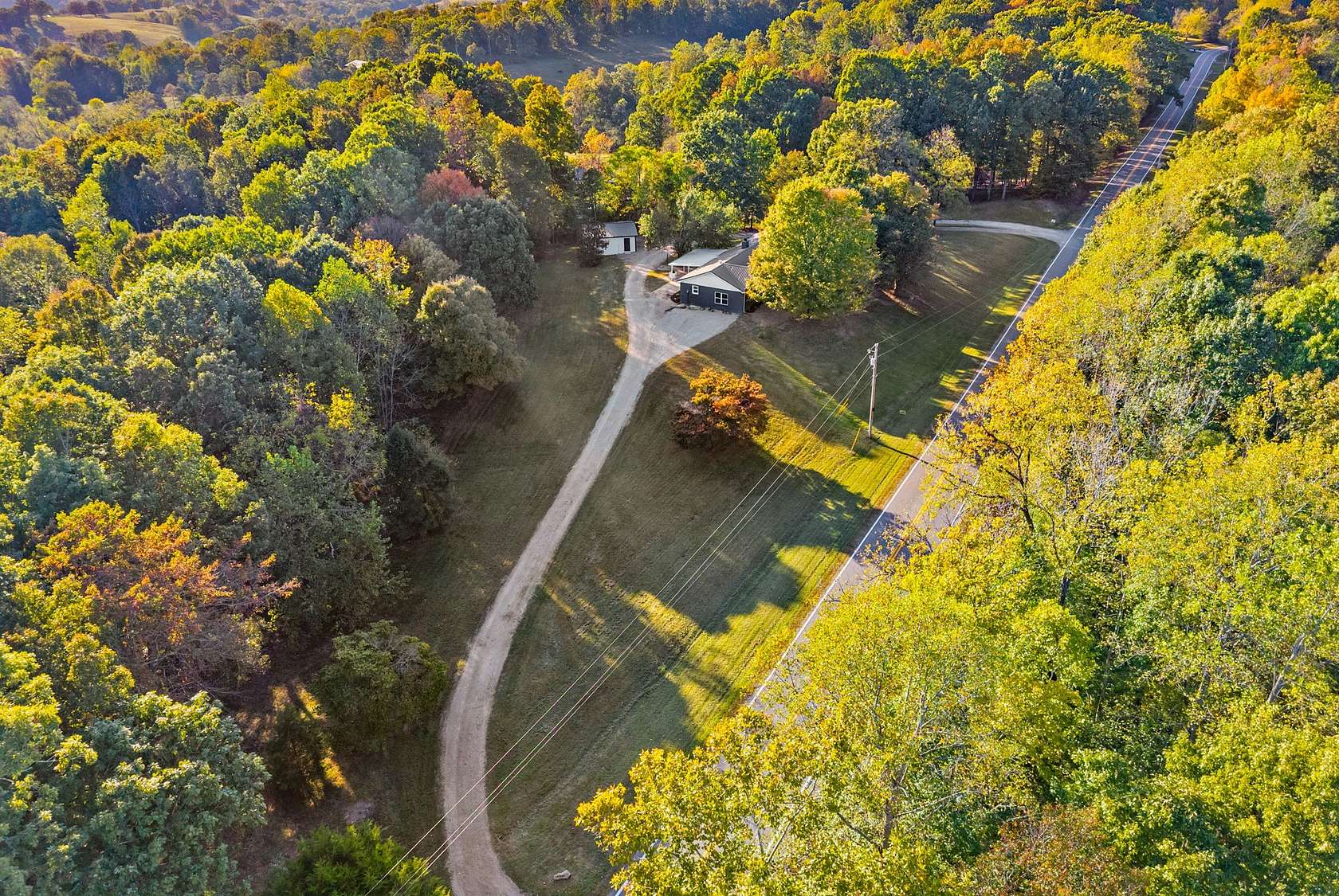2.5 Acres of Land with Home for Sale in Palmyra, Tennessee