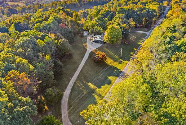 2.5 Acres of Land with Home for Sale in Palmyra, Tennessee