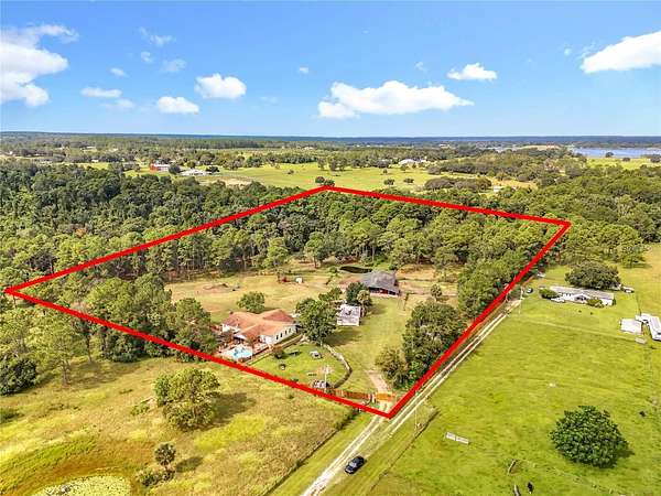 12.8 Acres of Land with Home for Sale in Eustis, Florida