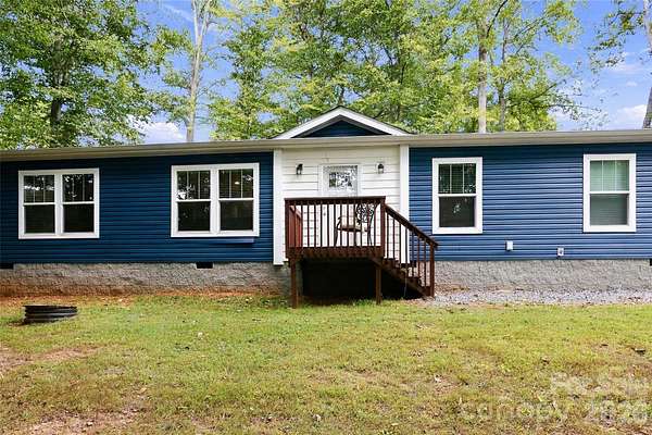 1.59 Acres of Land with Home for Sale in Candler, North Carolina