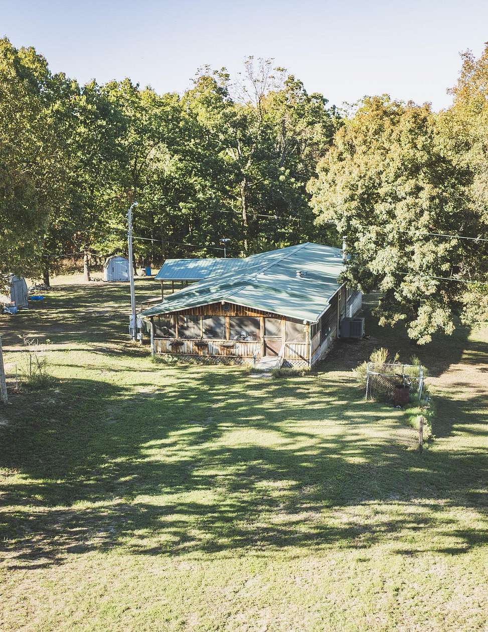 38.4 Acres of Land with Home for Sale in Powell, Missouri